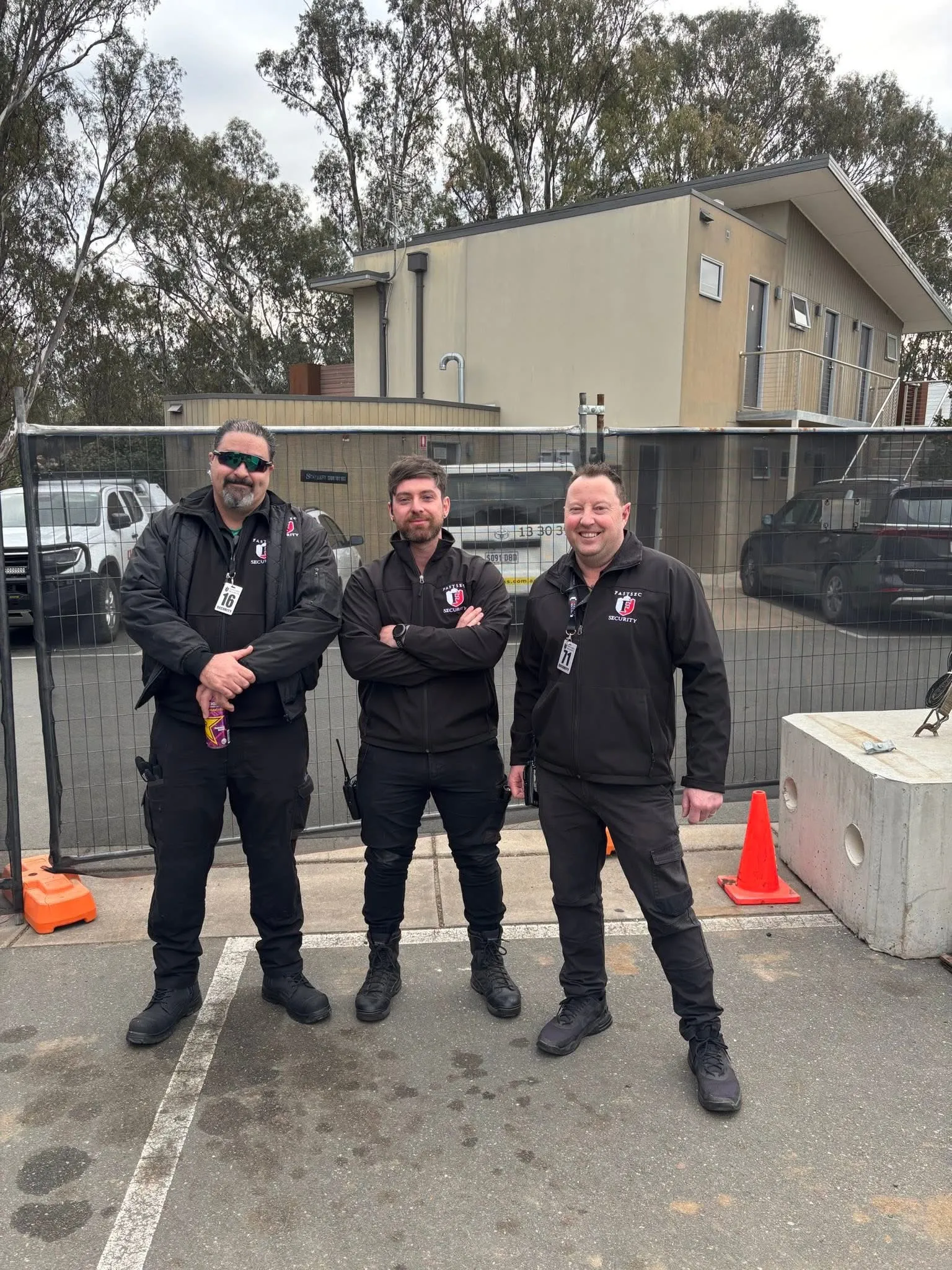 Fastsec Security guards outside a building during a daytime shift