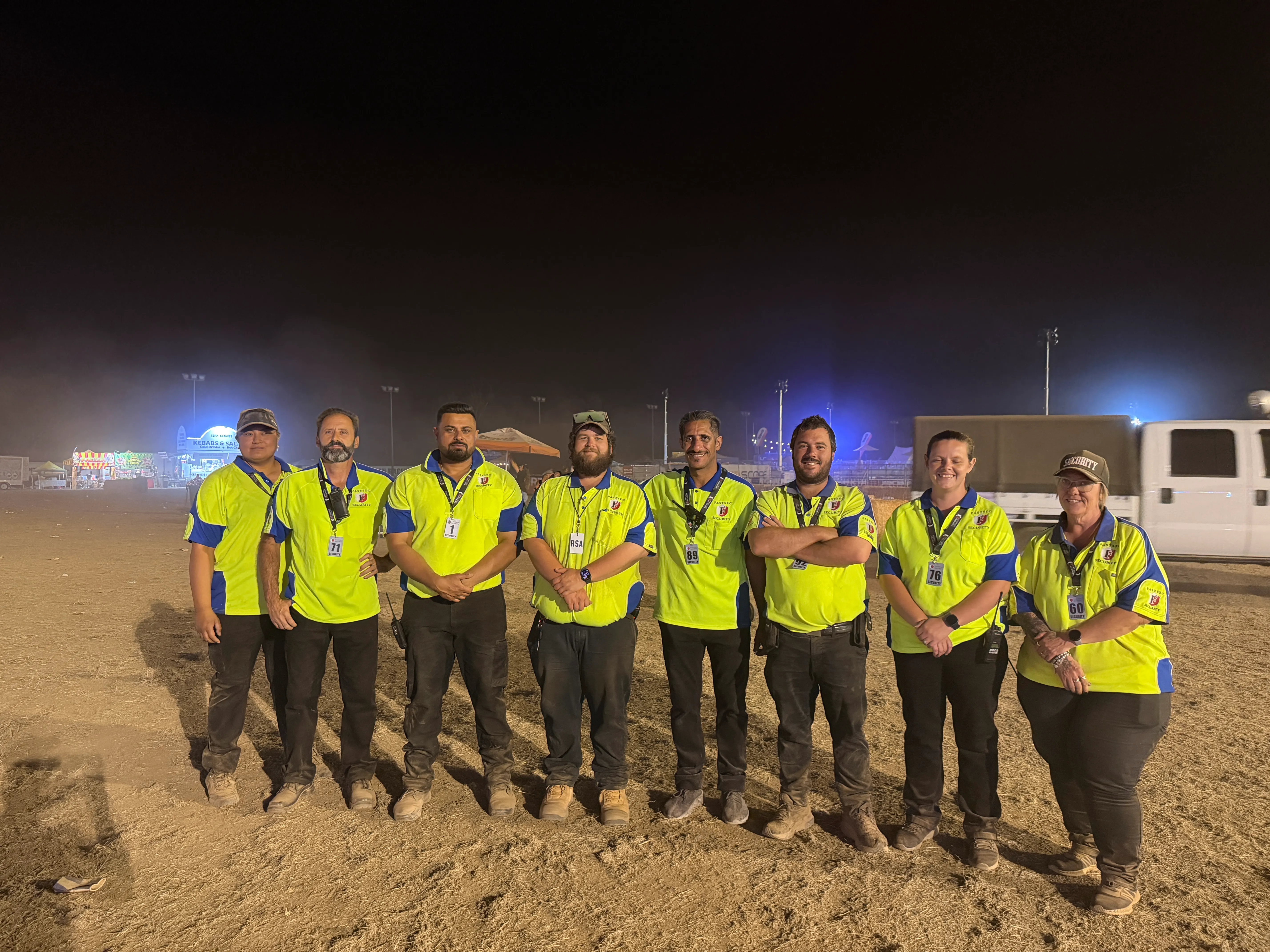 A large Fastsec Security team lined up on the field before an event opens