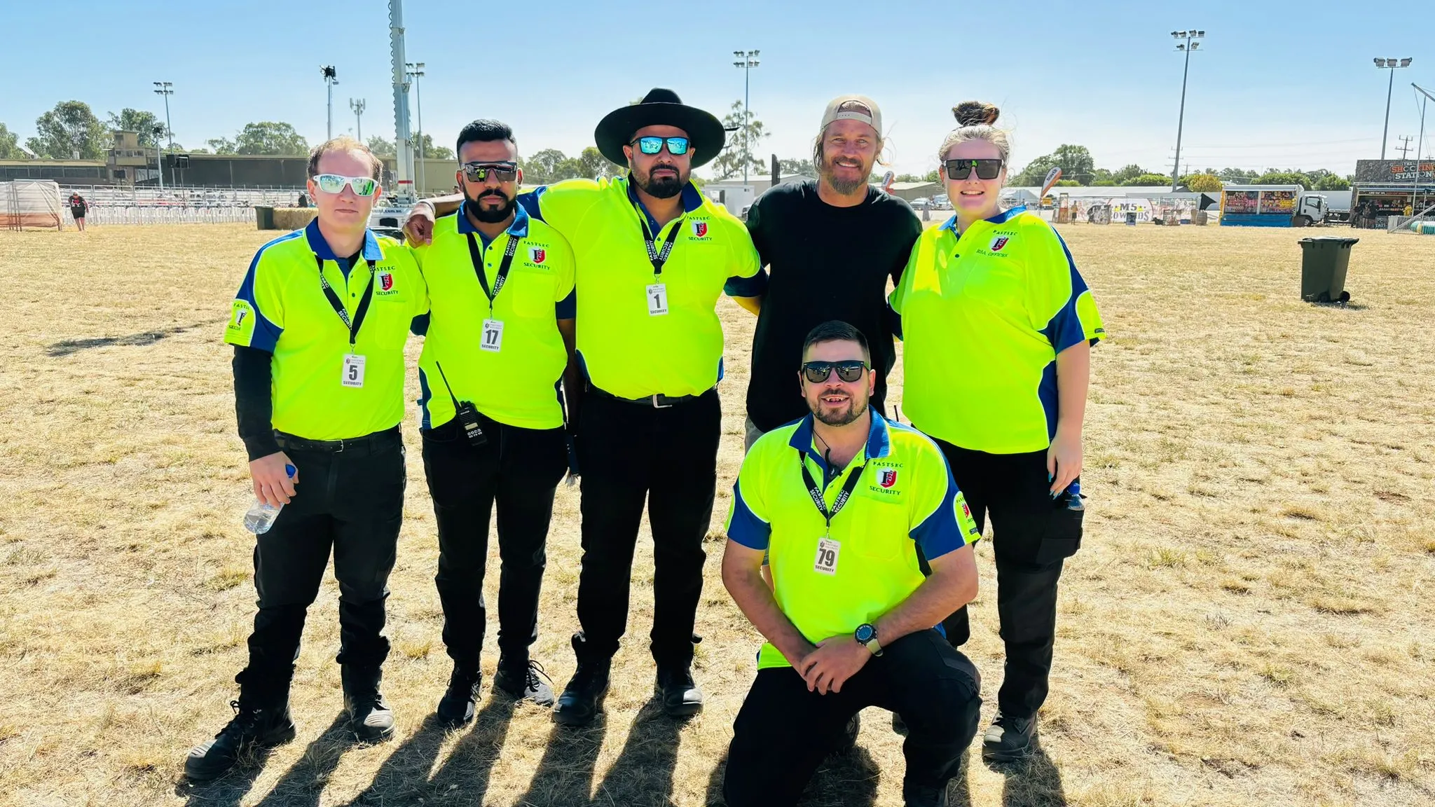 Hi-vis Fastsec Security guards working a daytime event in the high country